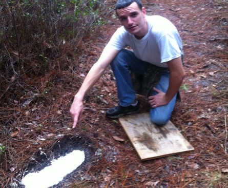 Omar Helms with cast of a Bigfoot footprint in Florida.