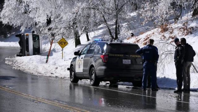 California Highway Patrol responding to a call of a van flipped off the road by a UFO. 